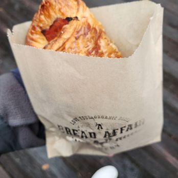 A Bread Affair - a person holding a bag of bread - Bakeries Near Me - Vancouver, British Columbia A Bread Affair - a person holding a bag of bread - Bakeries Near Me - Vancouver, British Columbia