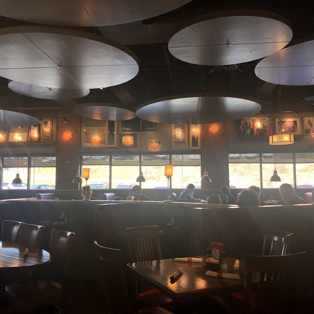 TGI Fridays Bridgeport - people sitting at tables in a restaurant - Burgers Near Me - Bridgeport, West Virginia TGI Fridays Bridgeport - people sitting at tables in a restaurant - Burgers Near Me - Bridgeport, West Virginia