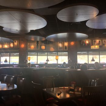 TGI Fridays Bridgeport - people sitting at tables in a restaurant - Burgers Near Me - Bridgeport, West Virginia TGI Fridays Bridgeport - people sitting at tables in a restaurant - Burgers Near Me - Bridgeport, West Virginia