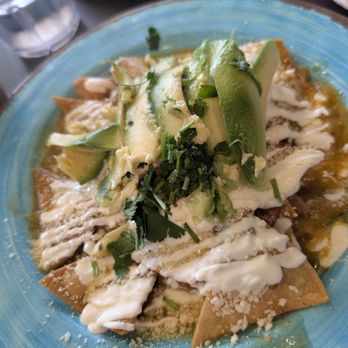 Atticus Cafe - Chilaquiles with mild salsa and avocado - Breakfast & Brunch Near Me - Anaheim, California Atticus Cafe - Chilaquiles with mild salsa and avocado - Breakfast & Brunch Near Me - Anaheim, California