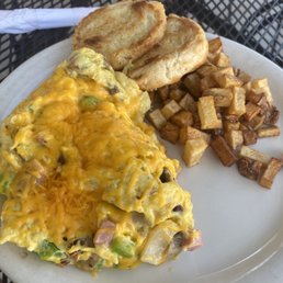 an omelet and potatoes
