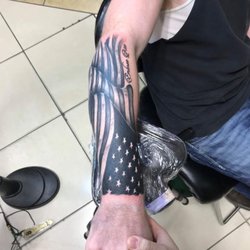 The Tattoo Emporium - Custom flag created by Lucy.