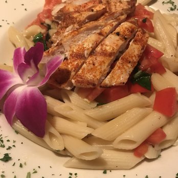 The Mucky Duck - Pasta with chicken - Seafood Near Me - Captiva, Florida The Mucky Duck - Pasta with chicken - Seafood Near Me - Captiva, Florida