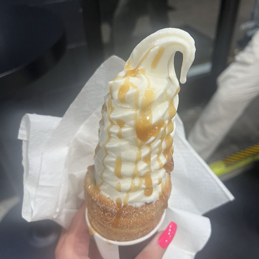 Crispy Cones - Vanilla ice cream, caramel sauce, regular cone with Nutella spread inside - Ice Cream & Frozen Yogurt Near Me - Orlando, Florida Crispy Cones - Vanilla ice cream, caramel sauce, regular cone with Nutella spread inside - Ice Cream & Frozen Yogurt Near Me - Orlando, Florida