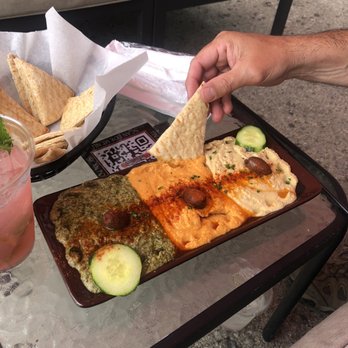 The Egyptian Cafe and Hookah Bar - Trio hummus-pesto, roasted red pepper and original - Hookah Bars Near Me - Indianapolis, Indiana The Egyptian Cafe and Hookah Bar - Trio hummus-pesto, roasted red pepper and original - Hookah Bars Near Me - Indianapolis, Indiana