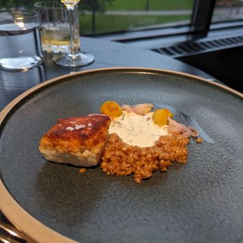 The Butternut Tree - a plate of food and a glass of wine - Canadian (New) Near Me - Edmonton, Alberta
