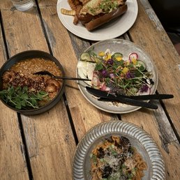 The risotto (left). Hand pulled pasta (bottom). A grilled salad. And a chicago dog i think The risotto (left). Hand pulled pasta (bottom). A grilled salad. And a chicago dog i think