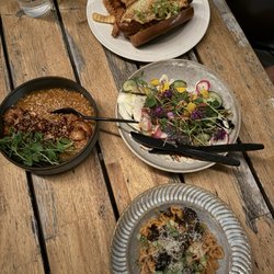 Kimski - The risotto (left). Hand pulled pasta (bottom). A grilled salad. And a chicago dog i think