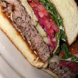 cheeseburger on house-made bun. cheeseburger on house-made bun.