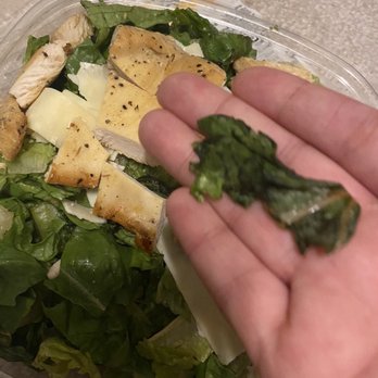 Wendy's - a hand holding a salad in a plastic container - Fast Food Near Me - Owings Mills, Maryland