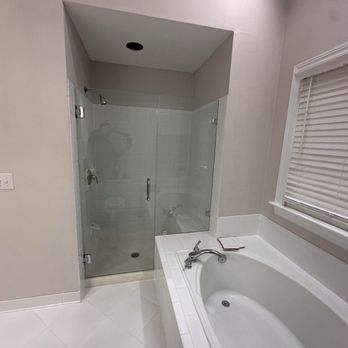Maven Glass - homeowner decided to freshen up the bathroom, remove the  old framed shower door had it rerouted and installed 38 door panel - Glass & Mirrors Near Me