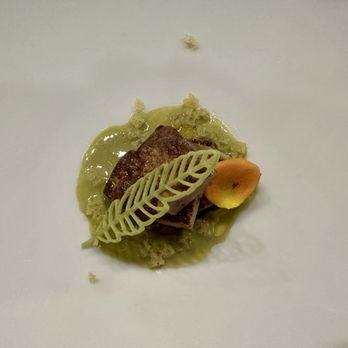Valentin Imperial Maya - Chef's Table. Foie gras served with onion and mixed berry jam with creamy basil matcha tea, verbena oil and crunchy focaccia bread. - Hotels Near Me - Playa del Carmen, ROO