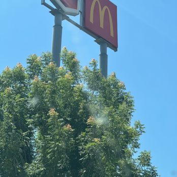 McDonald's - a mcdonald's sign and a mcdonald's sign - Fast Food Near Me - Fowler, California