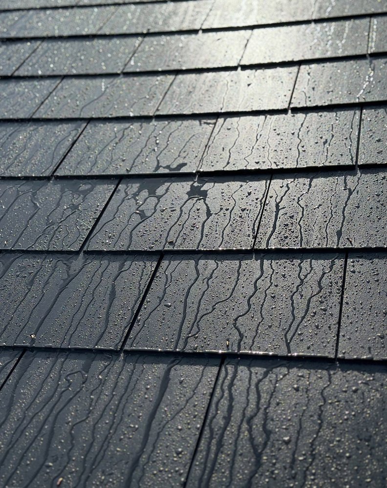 Slide of North Shattuck Roofing