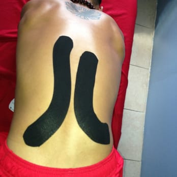 Simo Massage Therapy - Used StrengthTape for mid and low back pain. - Massage Therapy Near Me