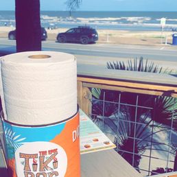 a roll of toilet paper on a table a roll of toilet paper on a table