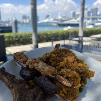 The Deck at Island Gardens - Barbecue meat options for lunch with paella - Mediterranean Near Me - Miami, Florida The Deck at Island Gardens - Barbecue meat options for lunch with paella - Mediterranean Near Me - Miami, Florida