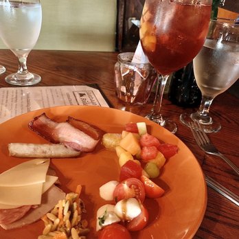 Santiago's Bodega - Selection of cheeses and meats with caprese salad, fruit and candied bacon and sausage. The sangria was delicious. - Spanish Near Me - Altamonte Springs, Florida Santiago's Bodega - Selection of cheeses and meats with caprese salad, fruit and candied bacon and sausage. The sangria was delicious. - Spanish Near Me - Altamonte Springs, Florida