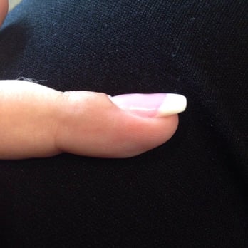 Vogue Nails & Spa - Hard to tell in picture but divets. near the nail bed & tip of nails are higher then where the artificial nail meets the real - Nail Salons Near Me - Katy, Texas