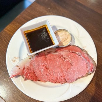 Prestons Restaurant + Lounge Edmonton - a large roast of beef on a plate with dipping sauce - Canadian (New) Near Me - Edmonton, Alberta Prestons Restaurant + Lounge Edmonton - a large roast of beef on a plate with dipping sauce - Canadian (New) Near Me - Edmonton, Alberta