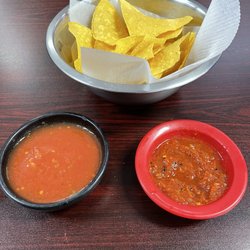 A La Parilla - Left- regular salsa  Right- spicy salsa