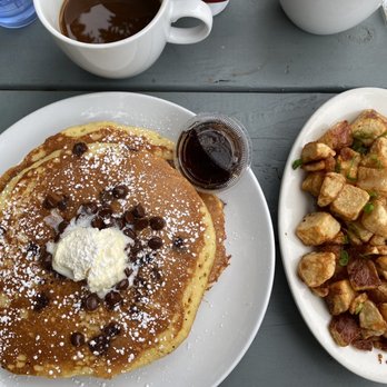 Milkweed - Chocolate chip pancakes, home fries side - New American Near Me - Boston, Massachusetts Milkweed - Chocolate chip pancakes, home fries side - New American Near Me - Boston, Massachusetts