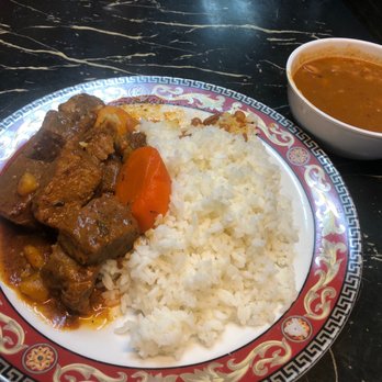 Mi Tierra Restaurant - Beef stew with rice and beans. - Dominican Near Me - Belleville, New Jersey Mi Tierra Restaurant - Beef stew with rice and beans. - Dominican Near Me - Belleville, New Jersey