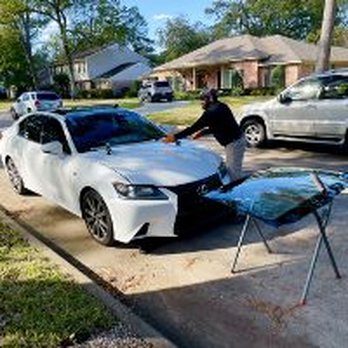 Windshield Fitters - TJ at Windshield Fitters repairing a front windshield. - Auto Glass Services Near Me - Houston, Texas Windshield Fitters - TJ at Windshield Fitters repairing a front windshield. - Auto Glass Services Near Me - Houston, Texas