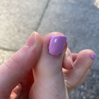 Elegancy Nail Studio - Nail polish on my toe, not cleaned up. - Nail Salons Near Me