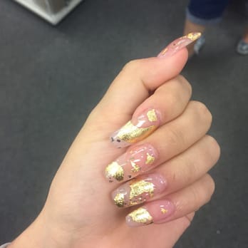 The Nail Lounge - Long square shape with metallic gold flakes. They have a lot of cool things to play with. By the one and only Cindy! - Nail Salons Near Me - Avon, Connecticut