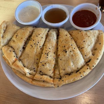 The Landing With Pizza 9 - Chicago beef calzone with dipping sauces - Beer Bar Near Me - Albuquerque, New Mexico The Landing With Pizza 9 - Chicago beef calzone with dipping sauces - Beer Bar Near Me - Albuquerque, New Mexico