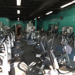 America's Fitness Center - Large cardio area with Treadmills, Cybex trainers, bikes and stepper.