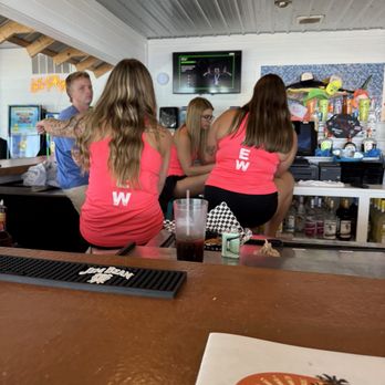 Coconuts - This is customer service? Sitting with your back to customers waiting at the bar, while scrolling on social media and smoking vapes? - Bars Near Me - Gravois Mills, Missouri
