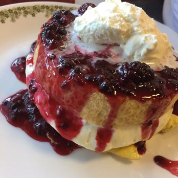 Fishtails Cafe - Marion berry waffle. Two French toast with a layer of cream cheese in the middle and Marion berries poured over the top. - Seafood Near Me - South Beach, Oregon