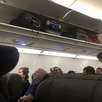 American Airlines - Open luggage space - Airlines Near Me - Chicago, Illinois