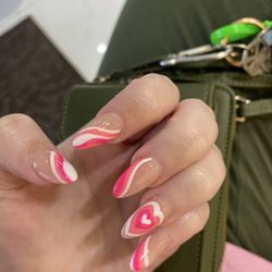 Nail Spa - Acrylic nails with pink and white designs