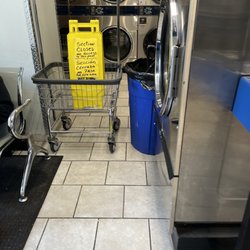 Norristown Laundromat - 6:30 the boy starts cleaning and limits access to the machines