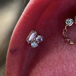 High Priestess Piercing & Tattoo - Helix piercing wearing the Mood end from Buddha Jewelry