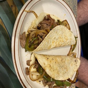 Nuevo Vallarta - two quesadillas on a plate - Mexican Near Me - Grand Blanc, Michigan Nuevo Vallarta - two quesadillas on a plate - Mexican Near Me - Grand Blanc, Michigan