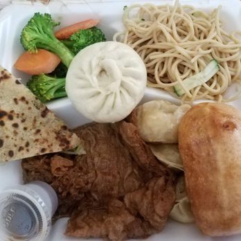 Fei's Cafe - Combo vegetarian meal with noodles, bao bun, sesame pancake, rice, and dumplings I think. - Taiwanese Near Me - Albuquerque, New Mexico