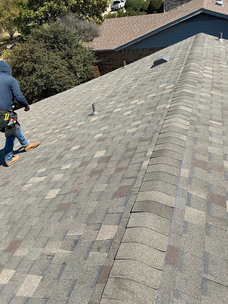 Slide of Apogee Roofing