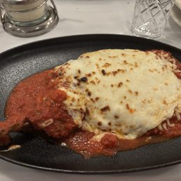 Pounded Veal Chop Milanese With Bruschetta Or Parmigiana Pounded Veal Chop Milanese With Bruschetta Or Parmigiana