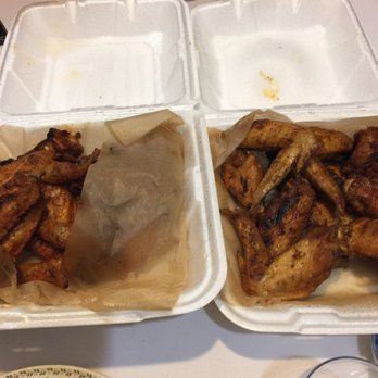 Hole In the Wall - Left: Mild. Right: Blackened-Honey. All perfectly cooked. (The mild were way better). (See the bump in the box? That was wing heat). - Sports Bars Near Me - Miami, Florida Hole In the Wall - Left: Mild. Right: Blackened-Honey. All perfectly cooked. (The mild were way better). (See the bump in the box? That was wing heat). - Sports Bars Near Me - Miami, Florida