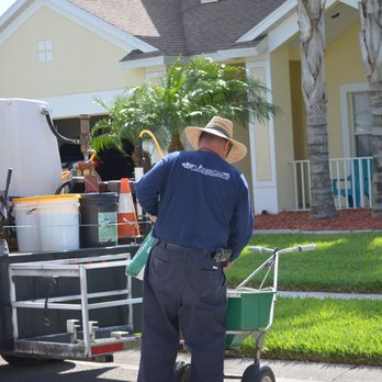 Floriscape - a man pushing a cart with supplies - Pest Control Near Me - Trinity, Florida Floriscape - a man pushing a cart with supplies - Pest Control Near Me - Trinity, Florida