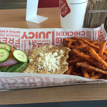 Smashburger - Grilled chicken spinach, cucumber, and goat cheese sandwich on wheat bun with sweet potato fries - Burgers Near Me - Pearland, Texas Smashburger - Grilled chicken spinach, cucumber, and goat cheese sandwich on wheat bun with sweet potato fries - Burgers Near Me - Pearland, Texas