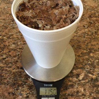 Rock Store Bar-B-Q - ows a portion of beef being weighed on a scale - Barbeque Near Me - Waxhaw, North Carolina Rock Store Bar-B-Q - ows a portion of beef being weighed on a scale - Barbeque Near Me - Waxhaw, North Carolina