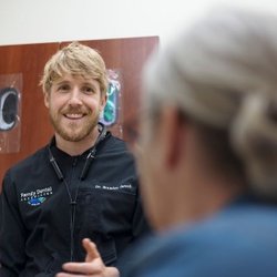 Family Dental Associates of Spring Hill - Dr. Brandon Jewell with a patient.
