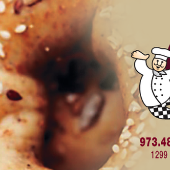 Simply Bagels - a chef holding a bagel - Bagels Near Me - Newark, New Jersey