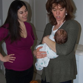 Dover Doula - Giving a mom some tips on soothing her baby. - Lactation Services Near Me