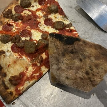 Grimaldi's Pizzeria - cancer causing black soot on the food - Pizza Near Me - Houston, Texas Grimaldi's Pizzeria - cancer causing black soot on the food - Pizza Near Me - Houston, Texas